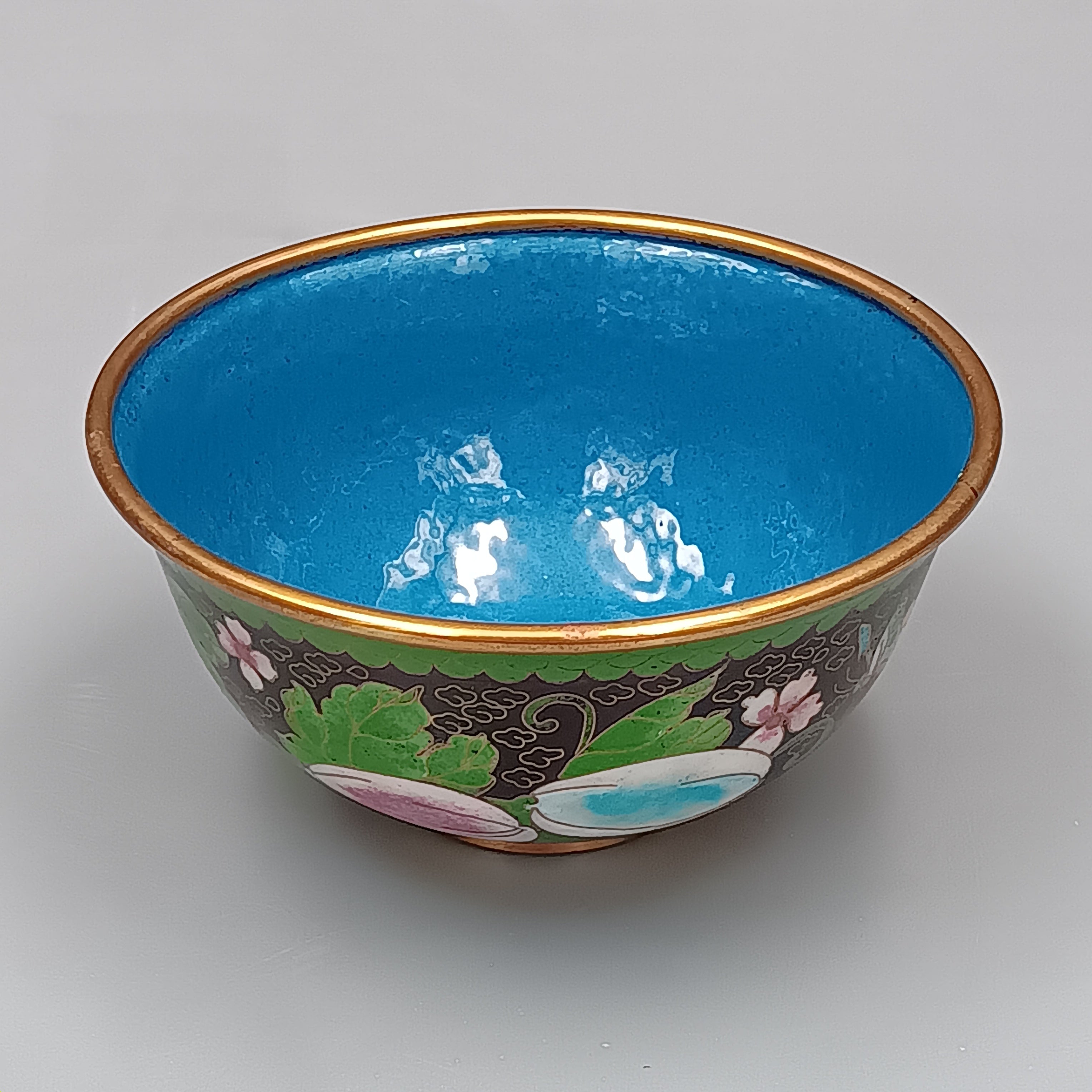 Mid-century Chinese cloisonné enamel bowl with blue interior and floral brass exterior, 5-inch diameter