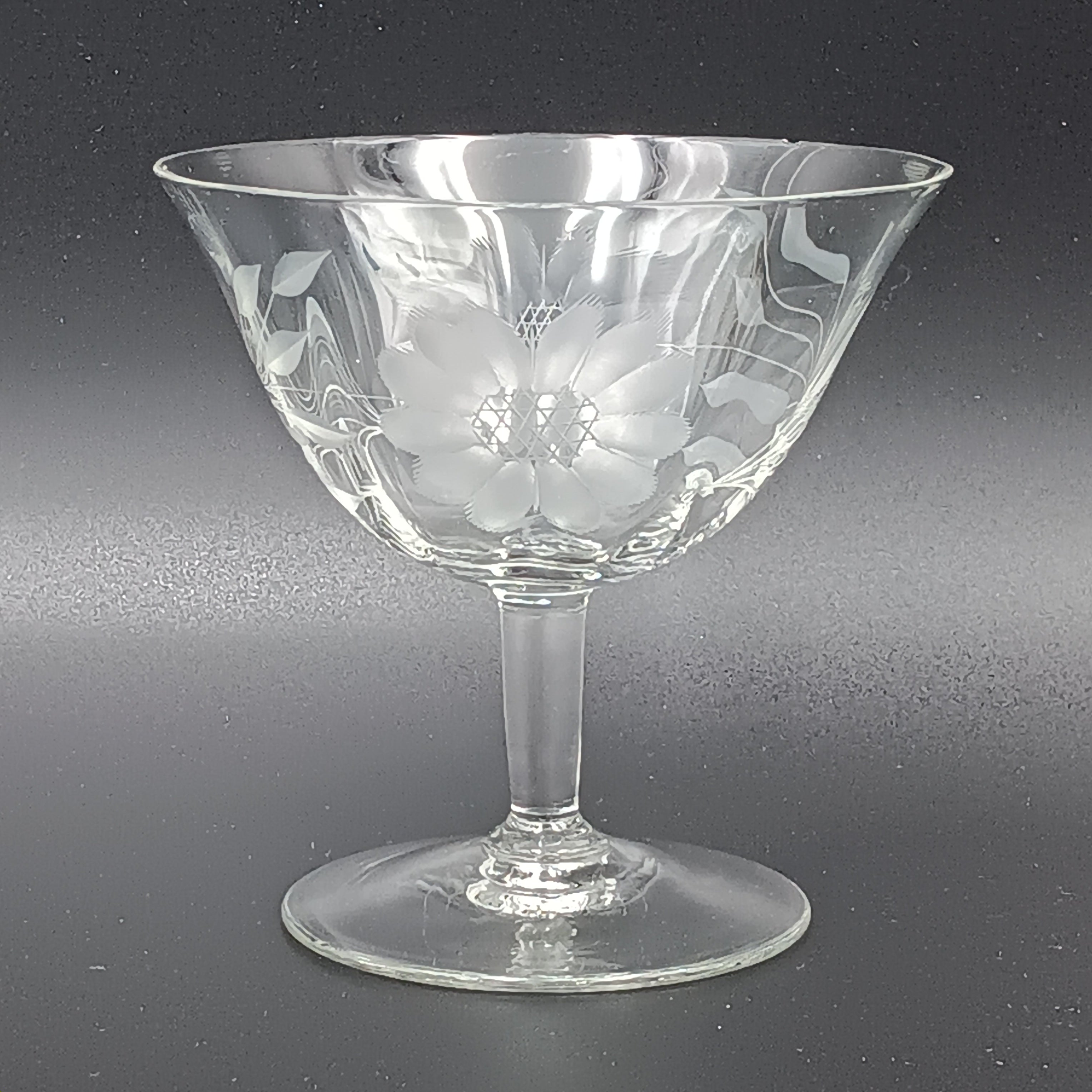 Vintage W.J. Hughes Cornflower sherbet glass with etched floral design, featuring a wide bowl, short stem, and flat base, crafted from clear crystal