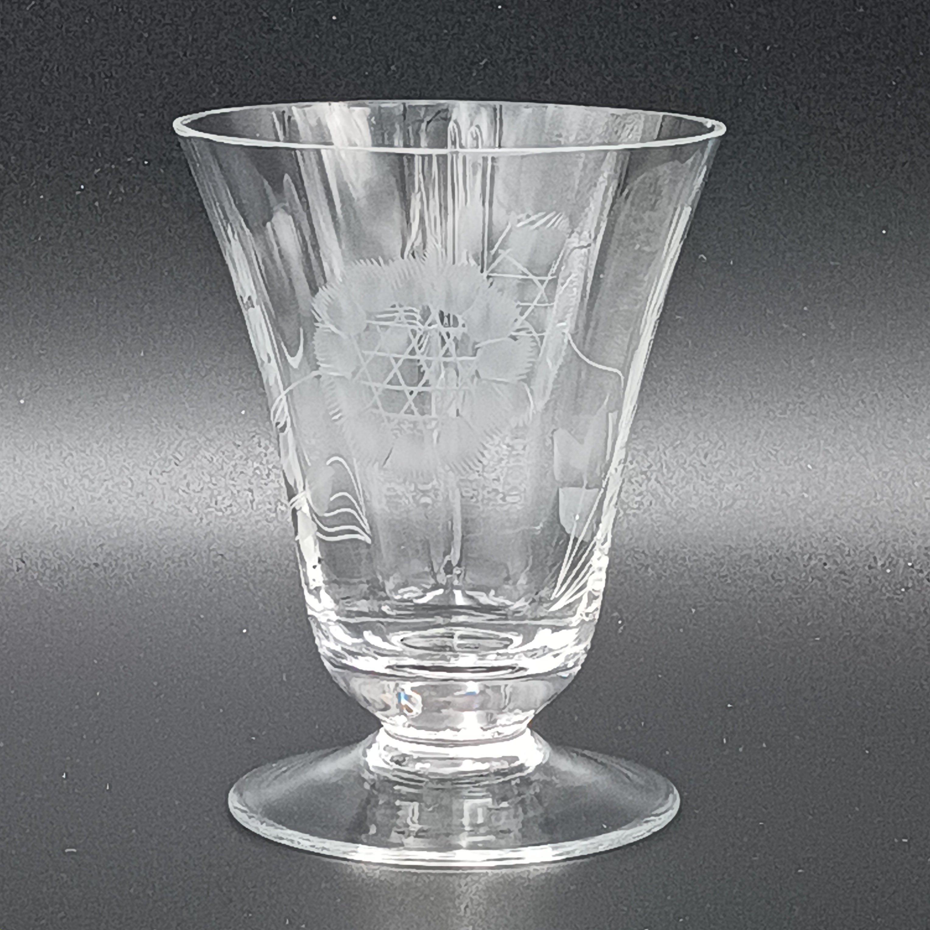 Clear glass W.J. Hughes Cornflower footed tumbler with etched floral design, wide rim tapering to a flared circular base