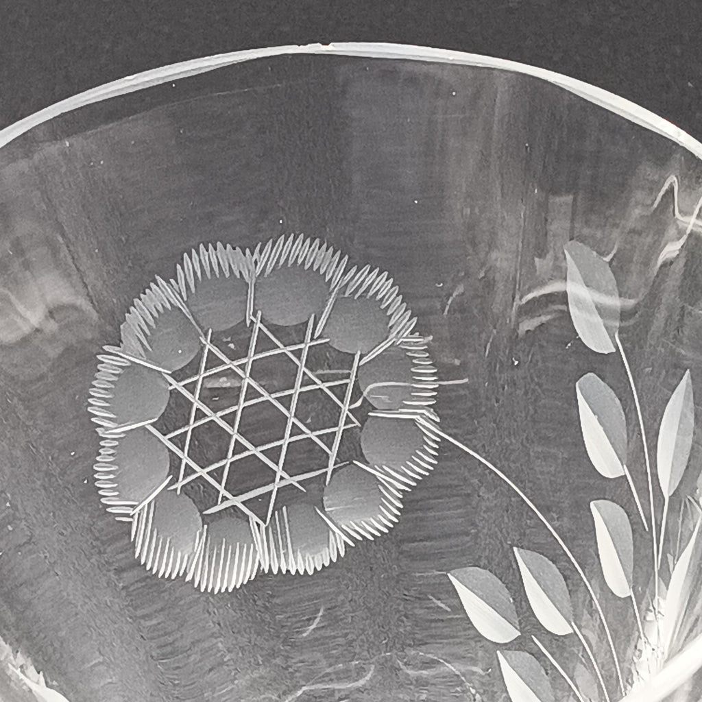 Clear glass W.J. Hughes Cornflower footed tumbler with etched floral design, wide rim tapering to a flared circular base