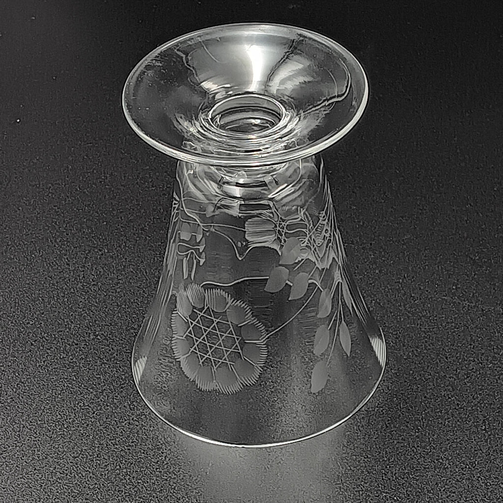 Clear glass W.J. Hughes Cornflower footed tumbler with etched floral design, wide rim tapering to a flared circular base