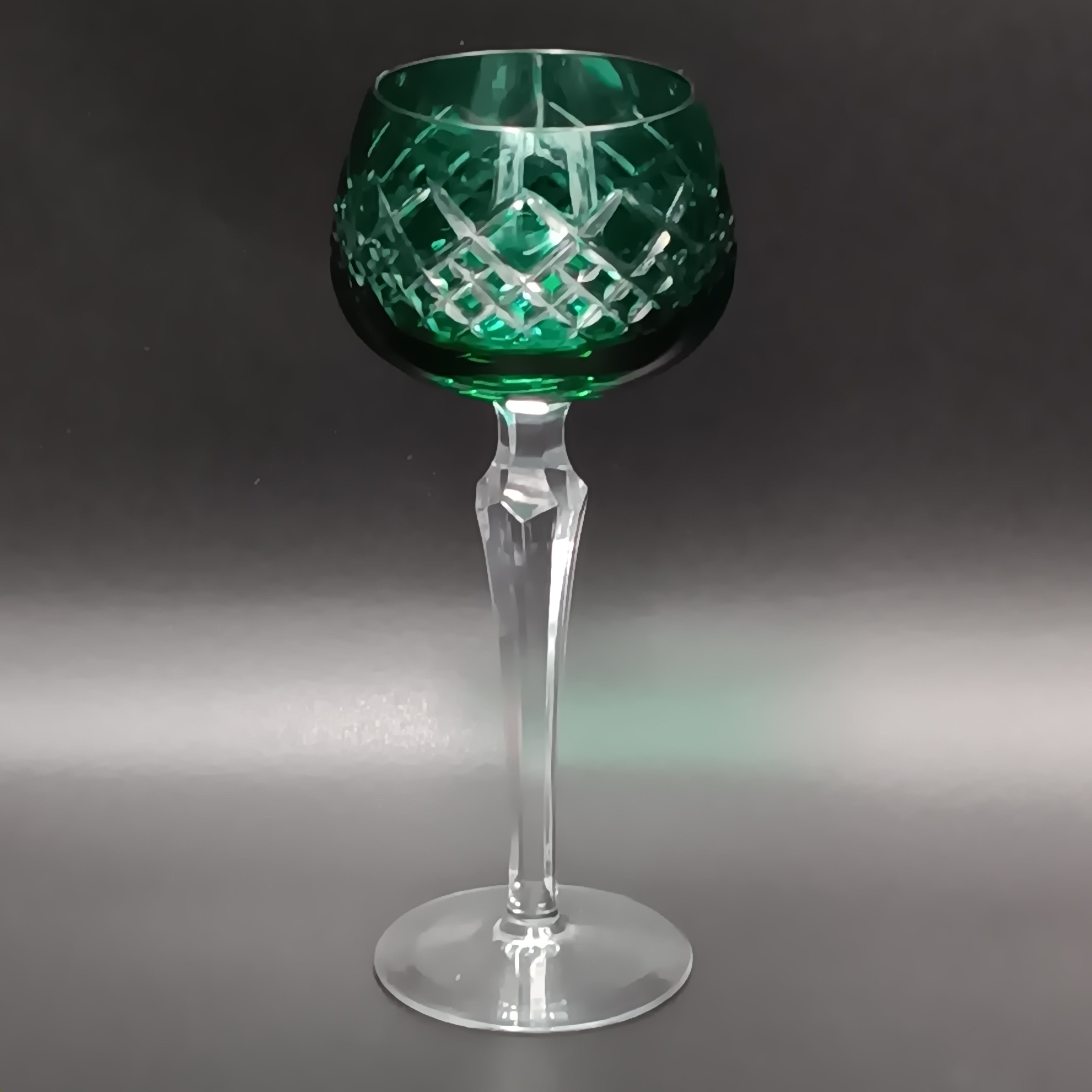 Elegant 7 5/8-inch cut to clear crystal wine glass with emerald green diamond-cut bowl, faceted clear stem, and round clear base
