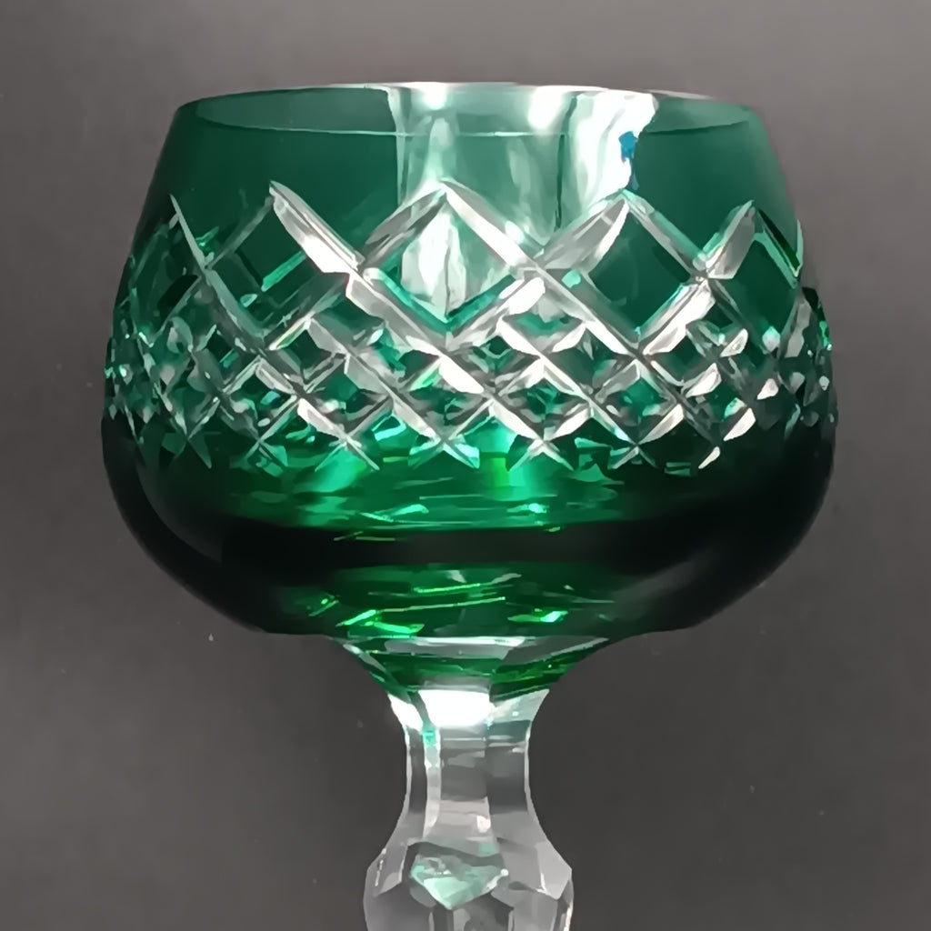 Elegant 7 5/8-inch cut to clear crystal wine glass with emerald green diamond-cut bowl, faceted clear stem, and round clear base