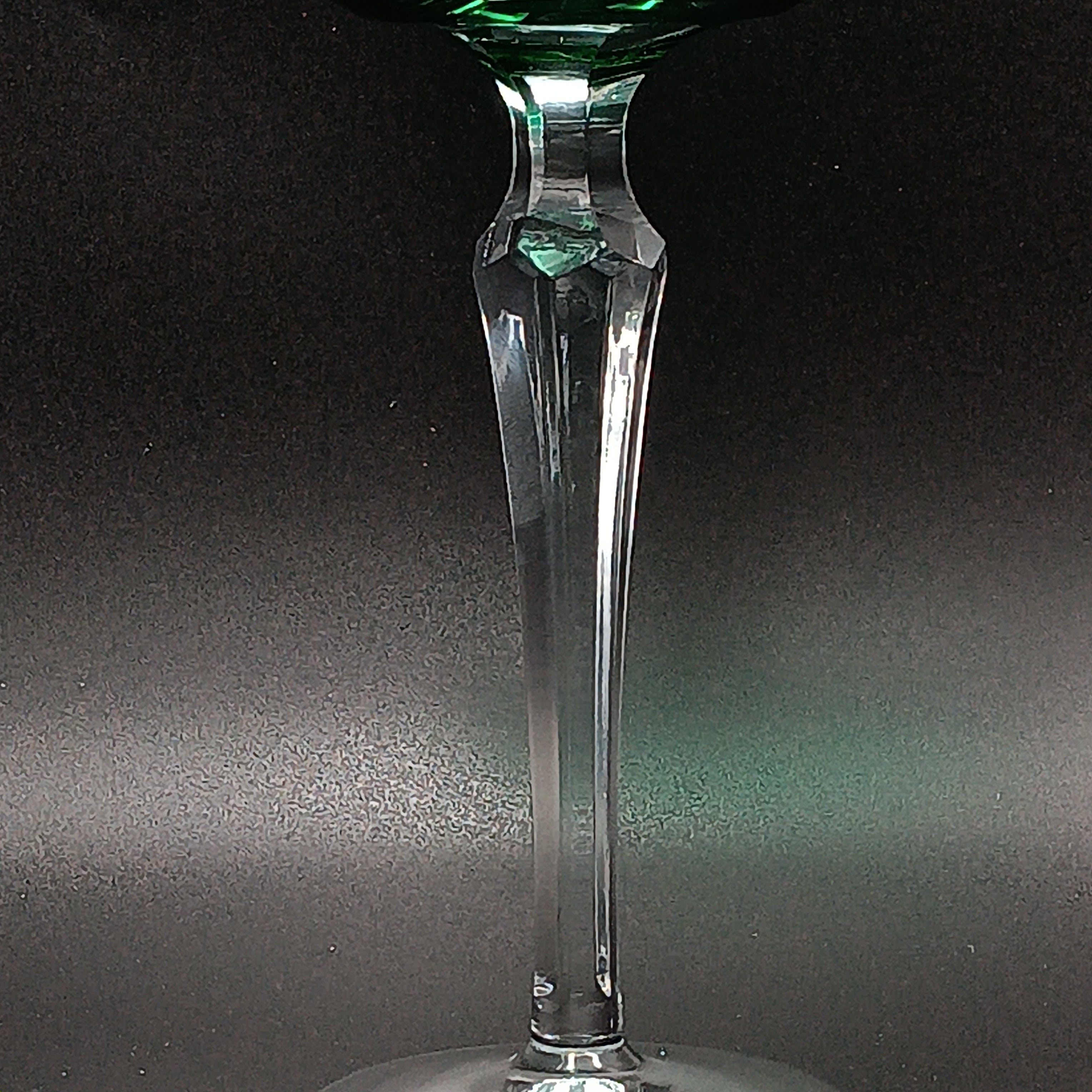 Elegant 7 5/8-inch cut to clear crystal wine glass with emerald green diamond-cut bowl, faceted clear stem, and round clear base