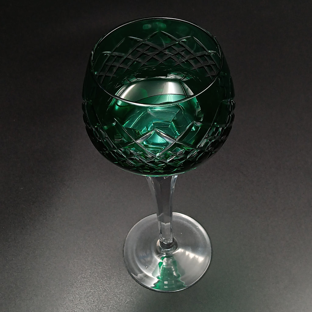 Elegant 7 5/8-inch cut to clear crystal wine glass with emerald green diamond-cut bowl, faceted clear stem, and round clear base