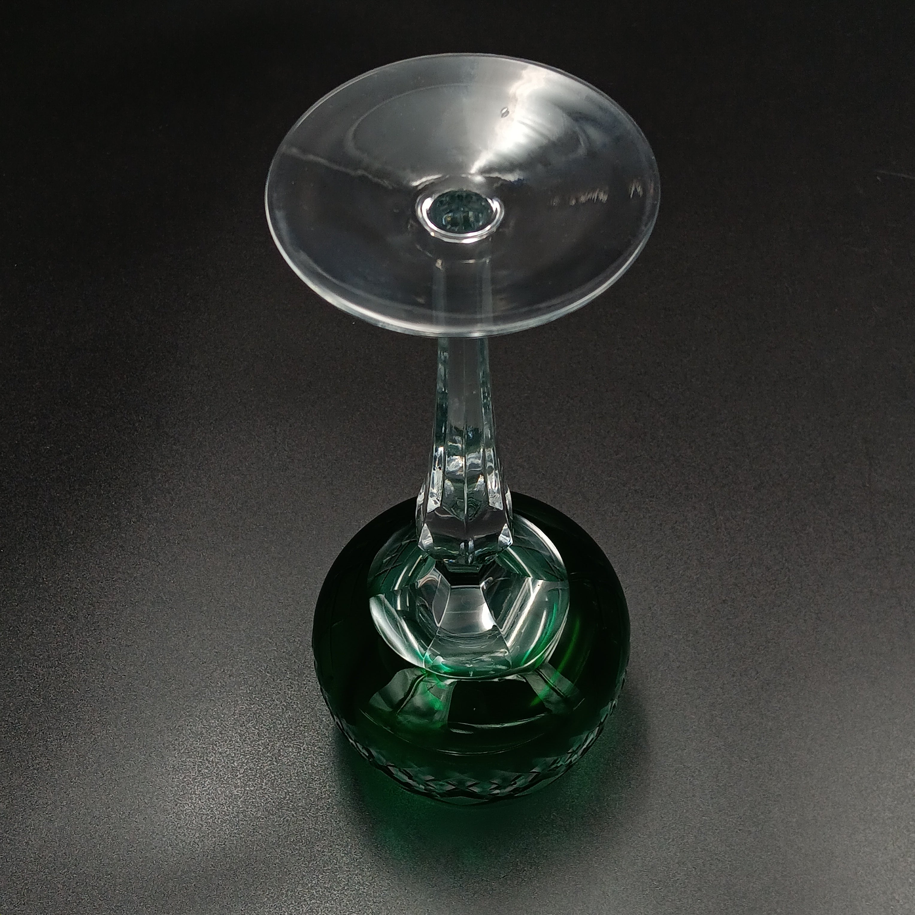Elegant 7 5/8-inch cut to clear crystal wine glass with emerald green diamond-cut bowl, faceted clear stem, and round clear base